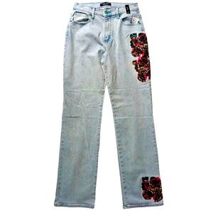 Rare avant garde “faces” embroidered jeans